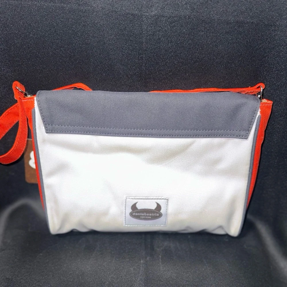 bébé Baby Face Crossbody Bag in Gray, White & Orange